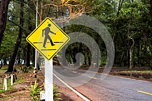 Traffic sign pedestrian crossing near beach