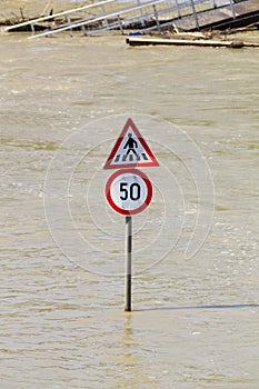 Traffic sign in and pierflood