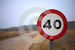 Traffic sign prohibiting driving at more than 40 km/h with a roa