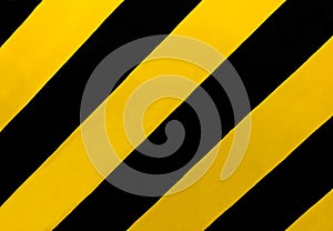 Traffic Sign: A rectangular sign with diagonal yellow and black stripes, wherever there is a median or other obstruction.