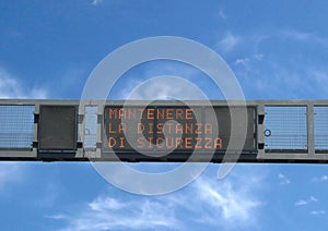 traffic sign with text Mantenere la distanza di Sicurezza that m photo