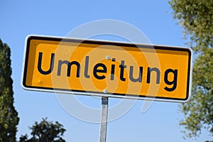 German road sign: Umleitung - hanging a bit to one side photo