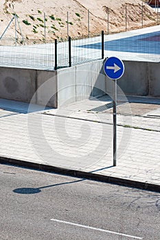 Traffic sign, white arrow to the right on blue background