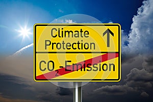 Traffic sign with the words climate protection and co2 emission