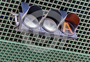 Traffic signal light at tollgate of tollway. Orange color