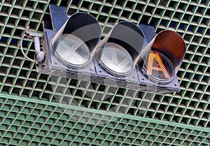 Traffic signal light at tollgate of tollway. Orange color photo