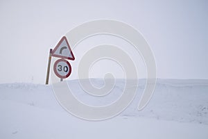 TRaffic signs in the snow