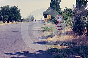 Traffic signs warning road transport