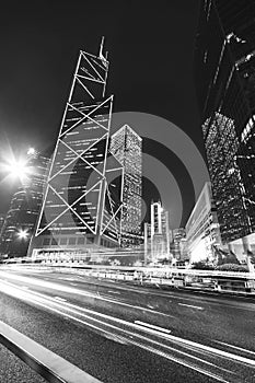 Traffic and skyscraper in Hong Kong city at night