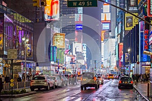 Traffic in Times Square, Manhattan New York. Features Broadway Avenue and Theaters, Animated Led Screens and Billboards