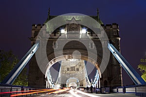 Traffic on The Tower Bridge at night in London, UK