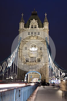 Traffic on The Tower Bridge at night in London, UK