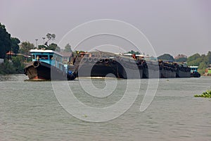 Traffic of vessels and boats on river