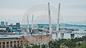 Traffic on the white bridge in the city of Vladivostok in the form of timelapses.