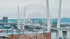 Traffic on the white bridge in the city of Vladivostok in the form of timelapses.