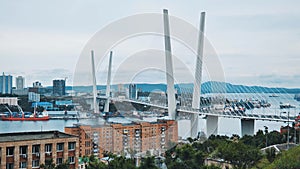 Traffic on the white bridge in the city of Vladivostok in the form of timelapses.