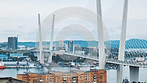 Traffic on the white bridge in the city of Vladivostok in the form of timelapses.