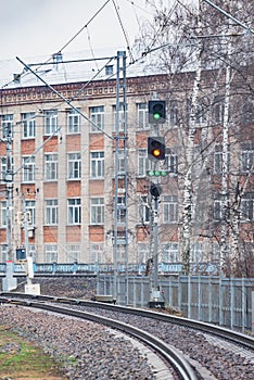 Trafficlight by the railway track. photo