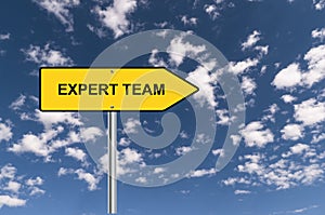 expert team traffic sign on blue sky