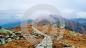 A trail along a mountain ridge high in the mountains