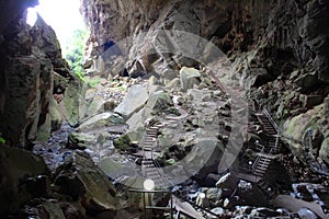 Trail in huge cave chamber photo