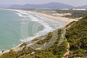 Trail in Costao do Santinho, Aranhas mountain