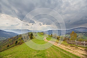 Trail in the countryside and mountains in the background