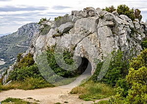 The trail from La Turbie to Tete de Chien going through a rocky mountaintop photo