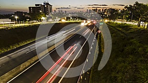 Trail of light caused by vehicular traffic in SP-294, Comandante Joao Ribeiro Barros Highway photo