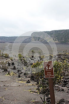 A trail marker at the beginning of the crossing of the Iki Crater on Kilauea in Volcanoes National Park, Hawaii