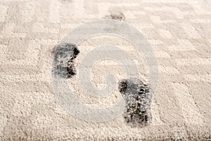 Trail of muddy footprints