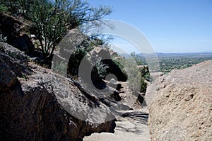 Trail pass between granite rocks at Pinnacle peak