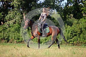 Trail riding in the summer park