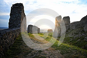 Trail in a ruined castle on the sunrise