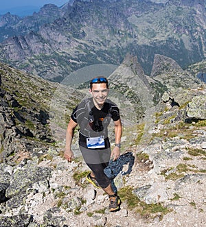 Trail runner, man and success in mountains