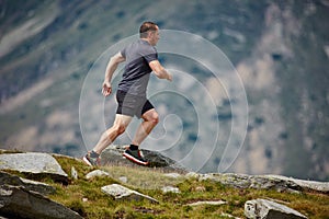 Trail runner in the mountains