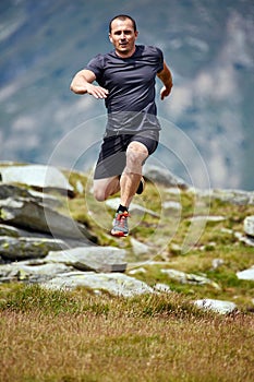 Trail runner in the mountains