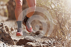 Trail running action close up of running