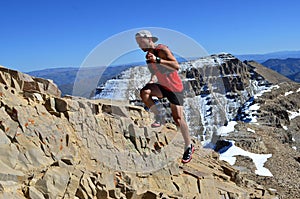 Trail Running Man on Mountain photo