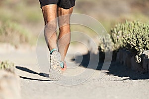 Trail running in summer sunshine concept for exercising