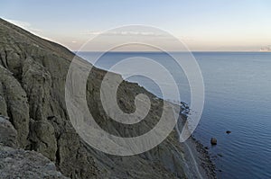 The trail runs along the seafront.