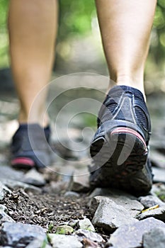 Trail walking in mountains