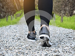 Trail walking woman legs with sport shoe Trailt Park outdoor
