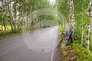 Trail in woods with touring bike