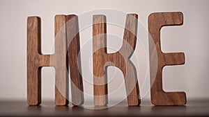 Trailblazing Décor: Decorative 3D \'HIKE\' Letters on Wooden Table