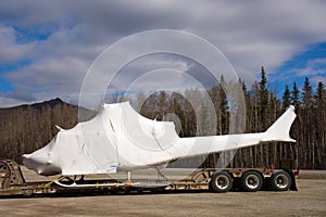 A trailer hauling a chopper in northern canada