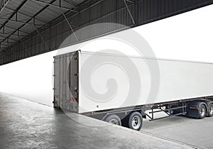 Trailer Truck Parked Loading at Dock Warehouse. Cargo Shipment. Industry Freight Truck Transportation. Shipping Warehouse Logistic