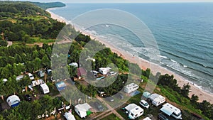 Trailers in camp site near Baltic sea, aerial view