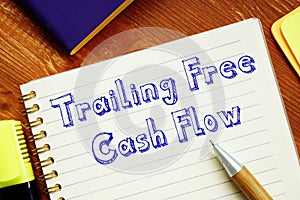 Trailing Free Cash Flow inscription on the piece of paper