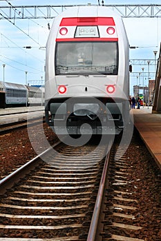 Double-decker train in station photo